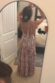 This dress exceeded my expectations! It fits beautifully through the waist, the fabric is light and flowy, and it moves so elegantly when you walk. Just a heads-up that it runs long; I'm 5'8" and definitely needed heels. Such a romantic, flattering dress that feels even prettier in person. - Alex H.