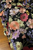 Lined and well sewn. The appliqués are very pretty. I don't wear heels so I had to hem it, but otherwise it fit me very well in medium. - Frances W.