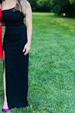 Must Need Long Black Dress for any occasion. I was very impressed with this dress. The fit was PERFECT and slimming. I wore this with heels and it was the perfect length for me. I LOVED the slit in the front. Fabric is great quality and not see through whatsoever. I've kept this dress as an emergency backup as it's a great option if I need it for another last minute occasion. - Tiffany T.