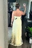 This dress definitely has potential. It truly is beautiful. I was excited about this dress but I was short on time so I ordered this dress in a Large after viewing the sizing. The dress fit perfectly on top in the bust area but the waist was very loose. There was a flower in the front on the bust line that was very oddly sticking up. I would've fixed it if I had wore it in the wedding but I chose another dress and returned this one. I think the Medium would've been a better size for me. This dress is extremely long too so if you are about my height you will need to make alterations to the length, even with heels on. For the tall girlies, this will be a great option for you! - Tiffany T.