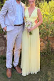 Had to add a review with a photo! Fits nicely and flattering neckline (not too low for a wedding), and the side view and back are very interesting and unique with Greek goddess-esque vibes. I am 5'7 and could use a tiny bit of a hem (in photos, I am barefoot), but instead will probably buy heels with a bit of a platform. Needs lil "cakes" or pad inserts for bust, but that is easy! Excited to wear this in a wedding after it's been steamed and accessorized! - Melissa K.