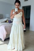 Absolutely love this dress! It is even more beautiful in person and fits so well. The side cutouts are very flattering and add the perfect amount of detail without being too revealing. The fabric and overall quality exceeded my expectations, and it feels elegant and perfect for vacation or a summer event. One of my favorite purchases! - Shani M.