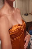 The color is NOT as bright as pictures. Ordered for a fall wedding & it was on sale for $40, so I got as a back-up. Color & silk is beautiful. I think style/fit depends on body type. Finally, fit is great for tall women! - Michelle S.