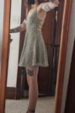 This dress is lightweight and comfortable. Worked perfectly for brunch with friends, would work well for a wedding, and I even accidentally wore it to a summer hockey game (thankfully, the rink was warm). The length is respectable, and as a small chested woman, I had no complaints about the top; however, I did need to use the sticky cup inserts to help fill the dress out. Would buy this dress in every color available. - Kat M.
