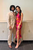 The dress was beautiful and the perfect length for a summer wedding. My only complaint is that there is a bit of extra fabric around the waist that pokes out, making me look bigger than I am. - Briana A.
