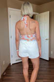 The colors are even prettier in person and perfect for summer. The fit is true to size, and the fabric is soft, stretchy, and incredibly comfortable. It's very flattering without feeling too revealing, and I love how it accentuates my waist. It pairs perfectly with shorts, jeans, or a skirt, making it easy to dress up or keep casual. I received several compliments the first time I wore it. Definitely one of my favorite summer tops - TINA L.