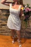 I bought this for my bridal shower. The florals were super cute for wedding vibes. I'm usually a small or medium, and I'm glad I went with the medium. Everyone said I looked stunning, and I agree! Love love. - Tara A.