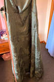 Loved the etherealness of this dress and the corset back and green color. Unfortunately, I had to return it because the middle section is long and sewn independently of the bust and hips, and it crashes right into my hips with no chance of flattening out. I ordered a XXL. Would have loved to wear it! - Cristina G.