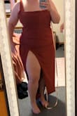 I do not recommend this for wide hips or big thighs. Top fit perfectly; skirt slit was 1 inch away from the goods. Would not be able to sit in it with discretion. Terracotta color was lovely tho - Cristina G.