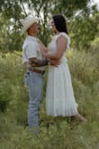 So I used this dress for my engagement photoshoot, and I loved it! I wanted something that would give me whimsical frolic vibes, and this did it 100%. It does run looser, BUT I am pretty positive it is supposed to be a little on the looser side, and if that is not something you prefer or look for, I don't think even sizing down would fix that style. - Regan I.