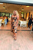 It fit great. I wanted something comfortable, but beautiful and I got that with this dress. I even felt sexy in it! You will need help fastening it, but it's easy to zip and the straps are adjustable. If you are chest heavy, the top is very loose and it is easy to have a slip. - Ashleigh O.