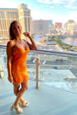 Stellina Orange Satin Cowl Back Mini Dress