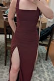 Fit was nice in the torso and bust with a comfortable drape through the hips. Beware straps are not adjustable so you'd need to get it altered. But overall the slit is SCANDALOUS. I have somewhat thick thighs and would never legitimately wear a slit that high unless I was going to the club or something. It's definitely giving "easy access for a bridesmaid who might wanna get busy in the bathroom" and honestly power to her but that's not me! - Lizzy O.