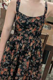 I was expecting a soft drapey dress, but the floral layer is like a stiffer, plastic-feeling tulle chiffon vibe. Just beware if you want something soft to the touch; this is not that. There's also no shape in the bust through to the waist; it just kind of drapes on you. It really feels like Lulu's quality is a fraction of what it was a decade ago, which might speak more to the fashion industry than anything. Where can people get something that doesn't feel like crap for under $100 anymore? - Lizzy O.
