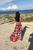 I wore this dress for a wedding in Mexico. The top was a tad big but I prefer it not to be too form fitting. Plus, you can adjust the straps and tie the lower part tighter if you need to. I did have to get the skirt hemmed, I believe between 2.5-3 inches. I received lots of compliments in it and felt super comfortable. - Victoria G.