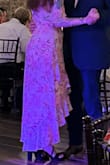 Fits amazing!! It's fitted without being too tight. It doesn't fit me quite right in the bust but I think that's a me issue and not a dress issue 
10/10 would buy again. Tried to crop my husband out of the first but it wouldn't go small enough and still have the whole dress
Second picture quality is trash, but I was trying to show the back of the dress - Rachel J.