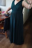 I ordered it in a size bigger than what I needed and got it taken in, so I would say the sizing is perfect. The only fault is the slit looks way higher in the photos than it is in person. - Zara C.
