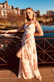 I love this dress so much! I am a little short but with heels it only dragged a little bit. And I am a smaller bra size but you can wrap the dress to fit you so it was perfect :) - Sophia O.