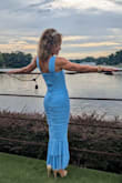 I am OBSESSED with this dress! The style was perfect for my mermaid themed birthday dinner. I am very petite at 5'0" and the length is just right, which is rare to find. The color is gorgeous and I received sooo many compliments on it! It was easy to move in and comfortable to wear for a few hours. I highly recommend this dress! - Megan A.