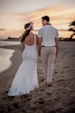This was my wedding gown when my husband and I decided to have a last minute wedding and honeymoon in Hawaii! I had to get it hemmed for sure and the straps taken in about one inch and it looked amazing! - Hannah R.