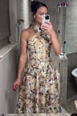 I love this dress! I wore it for a formal summer wedding; the material was light and flowy while maintaining an elegant structure. The dress fits true to size and is so flattering. At 6', I also appreciated the length. - Audrey L.