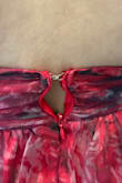 I wanted to love this dress because it looked so nice on! But the quality is poor. The material feels cheap; there were many loose threads and stitching, plus the zipper would not zip past where the bodice meets the waist despite having plenty of space size wise. I've exchanged for the green in hopes of that working, but the pink was very beautiful. - Jamie C.