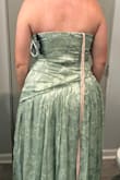 I love the way this looks and feels! It's a beautiful color, the fabric is nice, and the structure in the front is great. However, there is some buckling in the back as if my torso is too short. Unsure if I'll keep it or not. - Jamie C.