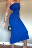 I'm 5'10, 130lbs (muscular and lean), purchased a size Small. I'm only a 32B, so the bust is a little big but everywhere else fits perfect. It's body forming yet still loose. I could probably wear an XS, but I love how the size small fits. This is just an absolute bombshell dress and I highly recommend it. - Molly B.