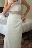I ordered several options from Lulus for my city hall wedding and liked this one the most! Honestly surprised how much I love it! The pleated part at the top of the skirt does hang a bit loose and awkwardly, but should be a pretty easy alteration. Not sure if I'll end up keeping this, but it's definitely a top contender for my wedding!! I ordered my normal size xs and would say it fits tts other than the pleated part. - Lindsay C.