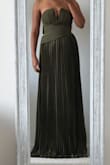 The dress looks nice on the front and will fit well. If you follow the size guide and measure yourself before buying. I am average height (5'5"), but it's so long even with heels on. I am disappointed by the stitching on the side. The drop waist does not go all the way to the back, and make it look so weird from the side, and the bottom of the dress does not flow well because of the misaligned stitching - Sesen T.