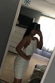 I didn't know what size to get but measuring my self and knowing the exact measurements made it so easy to pick out my size and it fit perfect! I have a small waist but wider hips but still fits perfect! I'm in love it's for my graduation. - Paula M.