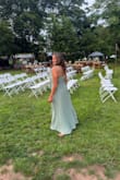 It fits very well, the drape is perfect; the fabric is wonderful; it's worth every penny. The cut is very well done. You don't need much to match it; the flower detail on the dress strap makes all the difference. - Silvanete G.