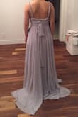 I bought these dresses for my bridesmaids for my wedding this summer. I was skeptical about the sizing as I never purchased from Lulus before this so I wasn't sure if I'd buy the wrong sizes. However, after chatting live with a Lulus staff, we decided to buy a size up for all the girls as Lulus runs small. I ended up also buying an extra size dress in case someone needed a size up. All the girls fit their dresses except one of my bridesmaid who had to exchange her dress for a L. The straps were a bit hard to figure out at first because there weren't instructions but once you figure it out, it's great. We found there were two options to putting the straps on. I think this dress is great for those who have both a smaller or bigger bust. It you have a bigger bust, loop it as advertised on the site. However, if you have a smaller bust, twist the roped straps for a crisscross so that it won't hang too low at the front. Worked out for my bridesmaids as half of them have larger busts and the other two have smaller busts. Wish I could show more pictures than just the two so I can show how the front looked on my bridesmaids. - Donna S.