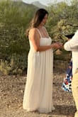 5 months pregnant and wore this for my wedding. The dress was flowy, long and fit true to size, but a tighter fit in bust. My only complaint is that the dress was torn at the seam in the back. I wish I would have examined it more in depth. Unfortunately, I didn't notice till the day of - Miranda G.