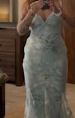 The dress runs a little small, in my opinion. The zipper seems too heavy for the fabric. It bubbles up and makes my left hip look twice as big as my right hip. I ordered a medium; I'm a size 8 and wear a medium in other Lulus dresses. I returned it because of the zipper, but would have kept it otherwise. It's a beautiful dress. I am 5'6", 140, 39-inch hips, 29-inch waist. - Amy C.
