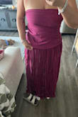 Ordered this dress for a black tie wedding. It fit me but the material on the dress was really weird. There was extra fabric in the ruching hanging over my hip, which was not pictured. Going to return it due to this. The way it laid made it look not black tie at all. I'm 5'6 and the dress was extremely long. - Emma B.