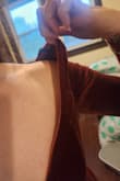 The whole dress fit like a glove, the zipper seems a little weak as it didnt want to zip together easily even when not wearing the dress. My BIGGEST issue was that she shoulder/chest area was odly baggy almost like it wanted to go off shoulder. Honestly it probably would have slipped right off if the torso wasnt as fitted as it is. Sad it wont work for our event. - Brook G.