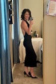 I love this dress! It is probably the sexiest thing I own, but I still felt very classy at an event with my lawyer boyfriend. It is very snug, but I wouldn't want a bigger size. It clung in all the right areas & the neckline draped beautifully. The fabric itself is stretchy, but the waistband doesn't give much. I had to wiggle to get it over my hips without popping a thread. I paired it with a long lariat necklace. I received so many compliments that night. - Cynthia C.
