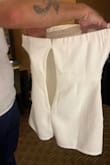 I hate that this is the review I have to give because I LOVED this romper. Having it on in Vegas was everything!! Unfortunately, the zip came COMPLETELY apart in the middle of dinner!!! God bless the small hook clasp, and my husband's white button up or a table of 16 would have gotten the show of a lifetime!! Fit like a glove; however, when I bent over to grab my purse, the whole back of the romper split open. The outfit was not too small; the zipper simply failed. I will say customer service was amazing and helpful and quickly provided a refund. - April G.