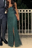 Fit very well! Got many compliments! It was a stunning fabric and color in person! FYI, I wore 4 heels and had to hem off a few inches myself due to the length, since I am 5 feet tall. But a great dress for a wedding! - Cristina F.