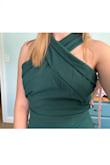 The top of this dress unfortunately didn't fit me at all. It must be designed for someone with a much larger chest. The straps are too long and gap around the arms, and the chest is quite loose with extra material. The material is nice and thick, and the color is pretty, but I'd have to get this altered to wear it out of the house. I do looove the height of the slit though! It's perfect on me! - Lindsay S.