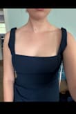 This dress is pretty flattering, but the design is a bit odd. The straps are super long on me, and the slit is incredibly high. I'm 5'4" with long legs, and the slit goes to my hip/bikini line. Sit down or get caught in a gust of wind and everyone would see your undies. I want to love this dress, but if it needs two alterations, I'm not sure anymore. - Lindsay S.