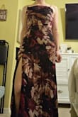 Pattern does give a bit of an "old woman" vibe, but overall the cut of the dress is flattering. I especially love the back. It is slightly tight around the rib cage area- nothing crazy, but I would consider going with a size up if you are between sizes, as it does not have any stretch. - Jenna M.