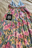 I love this dress, but I exchanged an XL for a Large, and you sent me a MEDIUM, and it is too tight around the waist, and the XL is too big! I ordered the XL first and then exchanged it for a Large! I want my Large, but now it's saying that I cannot exchange it for the Large that you were supposed to have sent me! I am upset. - Debbie S.