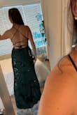 This is a tight fitting style, but I love it. I wish there was slightly more coverage for the boobs, but other than that is perfect. - Amy P.