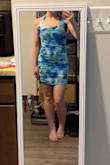 At first I thought there was a design flaw, but after looking at the dress on the model, I realized it was supposed to be asymmetrical at the top. I personally didn't love this neckline. I had to use fashion tape to keep my chest covered on one side, but I got this dress on clearance last minute for an event, and it got the job done. Everything else was great: length, fabric, stretch. I felt comfortable in it besides the neckline. And the colors are pretty. - Rylin Y.