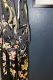 The dress came in poor condition, with a rip in the seam at the waist.  I don't know if this was a previous return that wasn't checked, but I ordered two dresses and one came with a band around it that you could not remove until ready to wear. This one did not come with that band. - Sondra T.