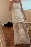 I wanted to love this dress so much, but it didn't meet my expectations. I am 5'6, 130-135lbs, I originally ordered the small and exchanged it for the extra small. The small dress fit, but the bust was very big. For someone who has 34D boobs, I was surprised by how much room I had between my chest and the fabric. The boning of the dress was a huge problem for me. The back was bulging out and made it look like there was a lot of extra room to fill. So I exchanged for the xsmall. The extra small fit but was a tad tight. The fabric was scrunching up, but it touched my bust area perfectly. The back was still bulging out, but now the strap that you rely on for support was extremely tight. I also noticed that my back was starting to get itchy and red. The strap has clasps like a bra and is not super supportive. I would have loved this if the strap was stretchy or a tie or if there was no boning, which ruined the dress for me. I found more of this styled dress elsewhere with no bulky boning. - Jamie R.