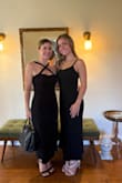 This dress was perfect for the wedding I attended. The fabric felt expensive. I am very petite and usually wear a small. I probably could have sized down to an XS. It was a little big in the bust area. The slit was also perfection. - Rae L.