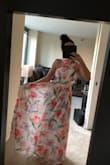 The only difference is that the photo on the website shows the dress to read more "pink", where in person, he other colors are also very visible, which takes away from the "pink floral" look that I was attracted to. Beautiful dress, weight and quality! Re-ordering in the solid Navy color instead. - Sarah P.